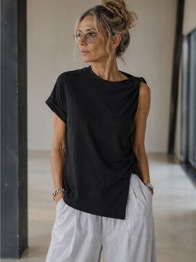 Clothes by locker room black asymmetrical shirt